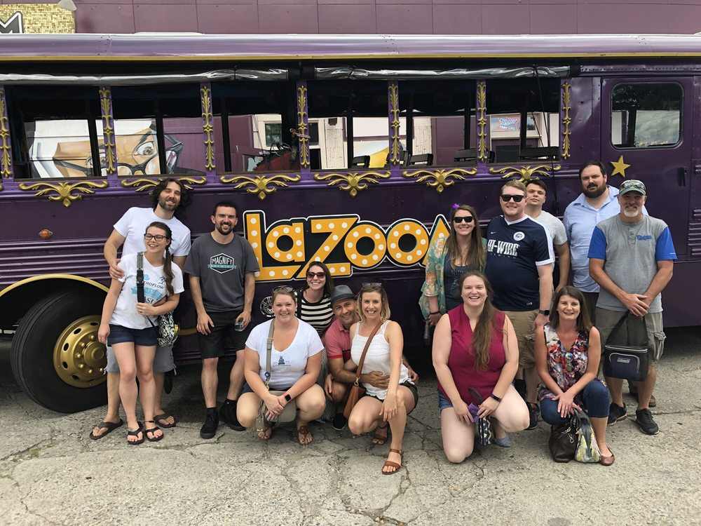 LaZoom purple bus, best idea to babymoon in north carolina

